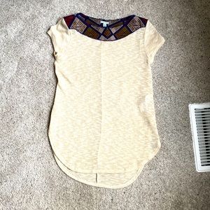 Tunic like cream shirt with top design